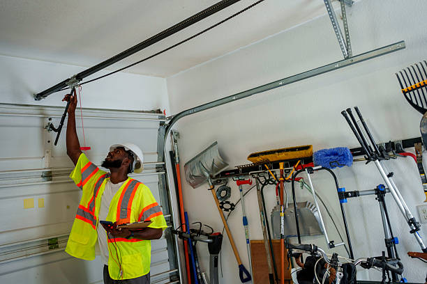 Professional Garage Door Panel Replacement technician working in Greer County County, OK